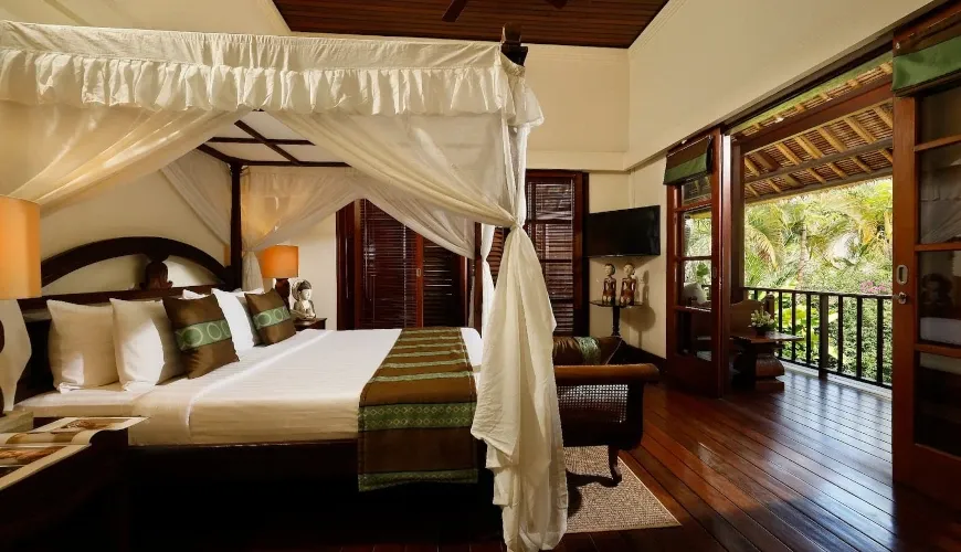 Spacious master bedroom, lush outdoor balcony at Villa Nayra