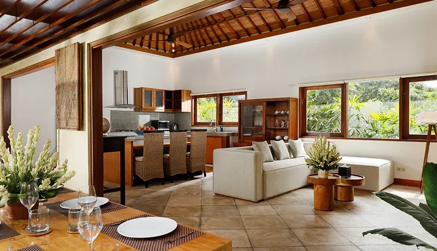 Comfortable living space flows into a stylish kitchen design at Villa Perere9