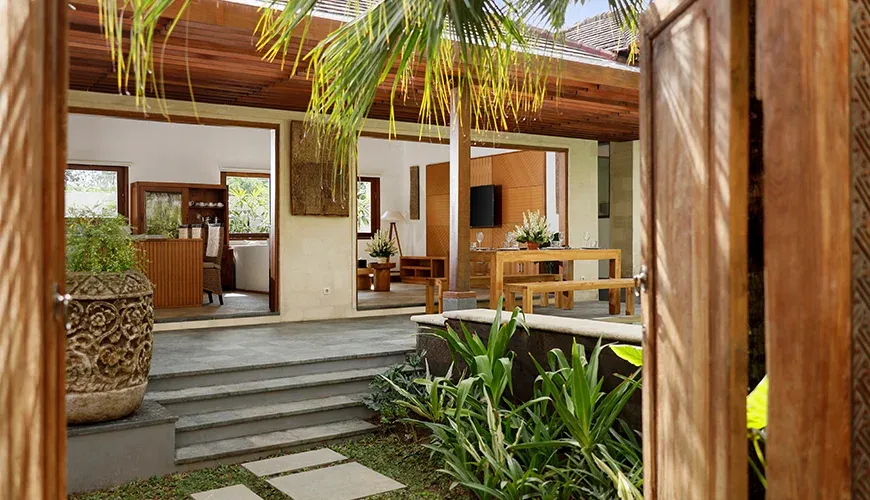 Inviting entrance to a tropical villa with a garden at Villa Perere9