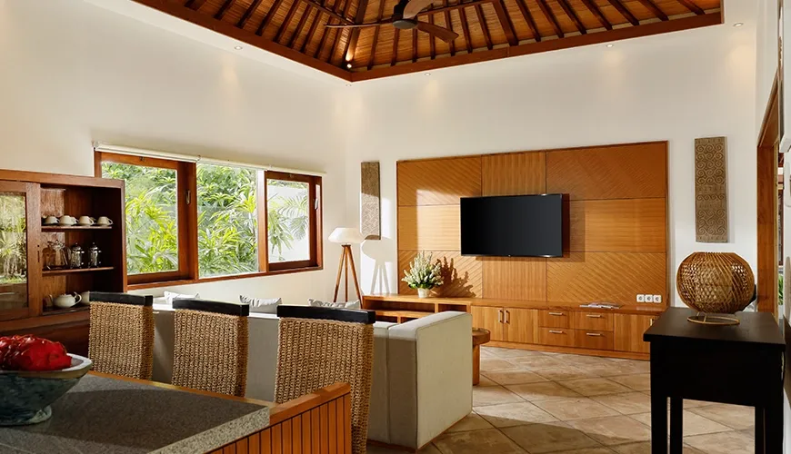 Open-plan living dining area with modern furniture and pool view at Villa Perere9