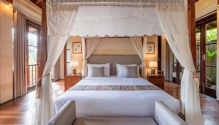 Romantic Bali villa master suite with lush views at Villa Pulung Jimbaran