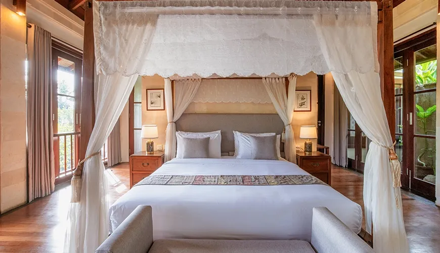 Romantic Bali villa master suite with lush views at Villa Pulung Jimbaran