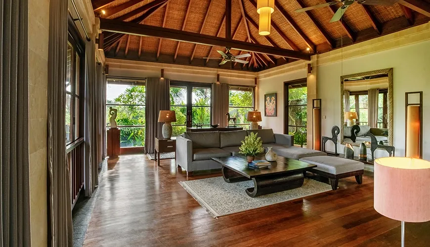 Stunning and spacious villa living area with high ceilings and a comfortable, contemporary sofa at Villa Pulung Jimbaran