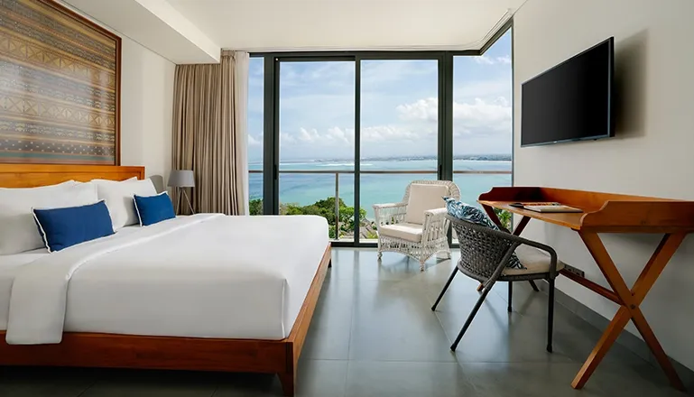 Luxury Bali bedroom with breathtaking ocean views at Villa Santos Cliff View