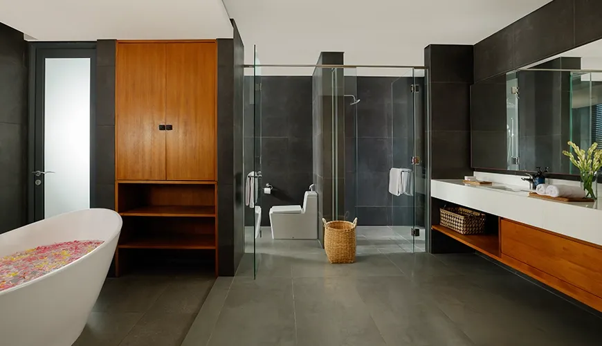 Luxury Bali villa bathroom with modern spa tub at Villa Santos Cliff View