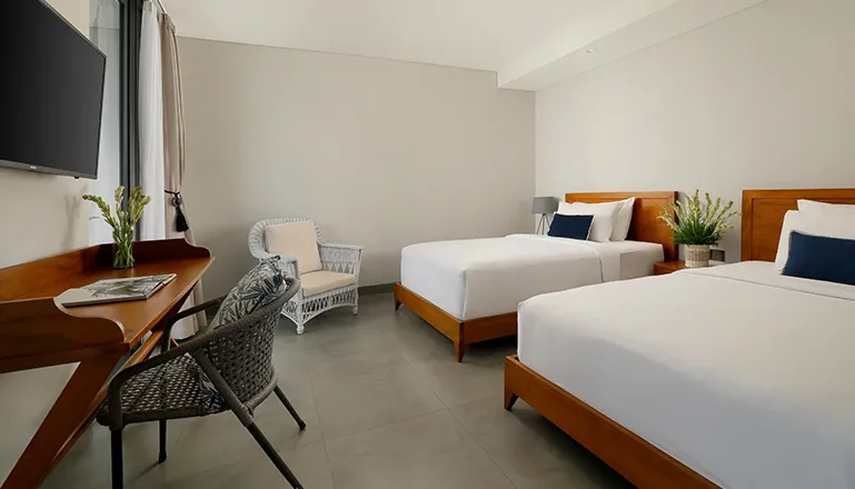 Modern Bali villa twin bedroom, sleek and comfortable at Villa Santos Cliff View