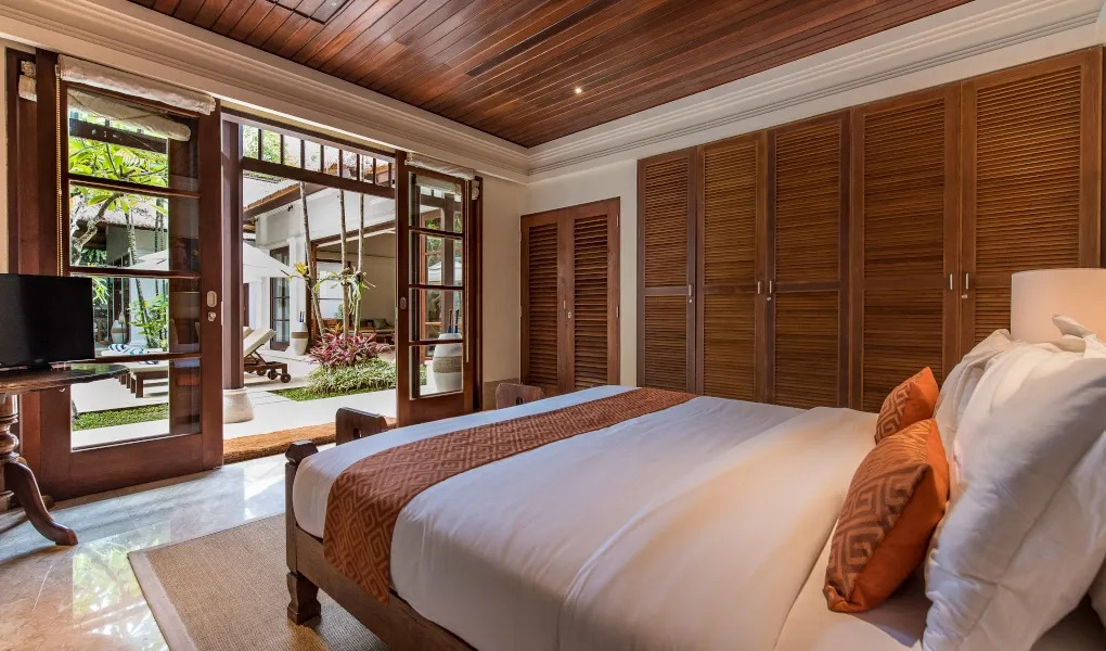 Balinese guest room with private garden and pool at Villa Senada
