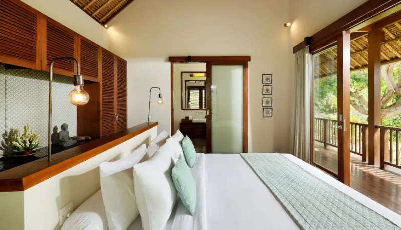 Bali guesthouse bedroom, balcony view at Villa Uma Nina