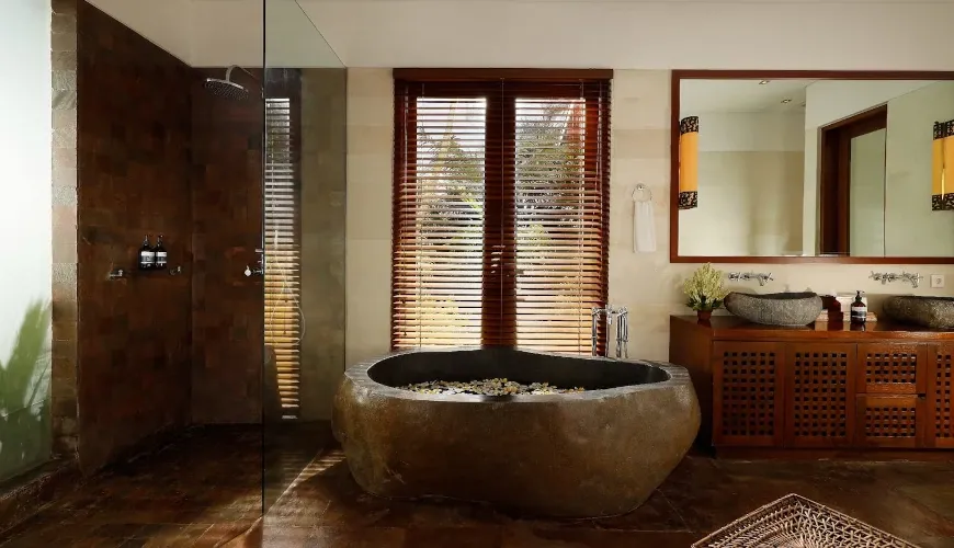 Luxury Bali master bathroom stone tub at Villa Uma Nina