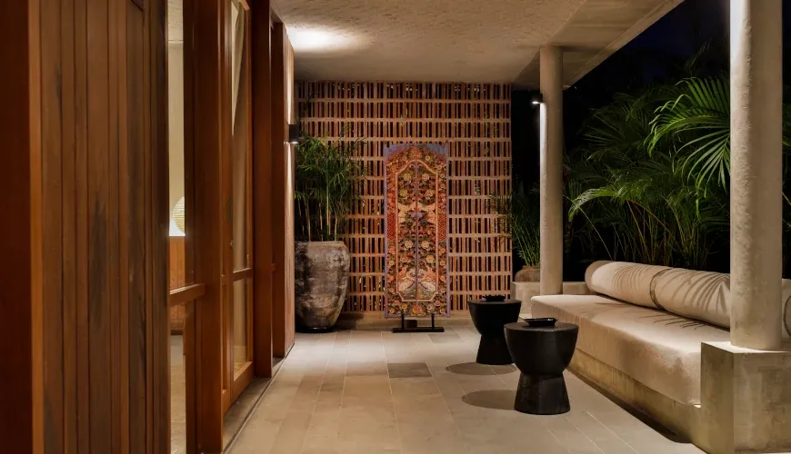 Evening photo of a communal villa terrace with seating at Villa Uma Santai Pererenan