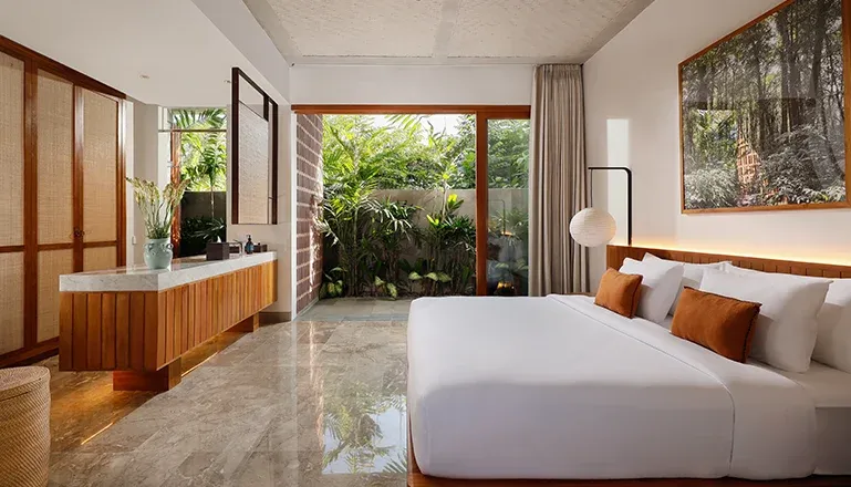 Spacious bedroom in a tropical villa with natural light at Villa Uma Santai