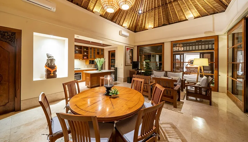 Open dining area connected to a modern fully equipped kitchen at Villa Yasmine