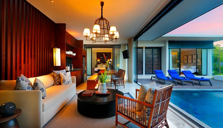 Luxury villa living room with private pool access at sunset in vinila villas